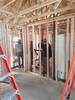 Plumbing students working on a Habitat for Humanity house in Granger