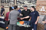 Returning employers from Weyerhaeuser network with students at Perry Tech's Spring Employer Expo Thumbnail