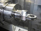 CNC mill-turn machine producing a titanium part for a Boeing 777 aircraft Thumbnail