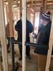 Plumbing students working on a Habitat for Humanity house in Granger